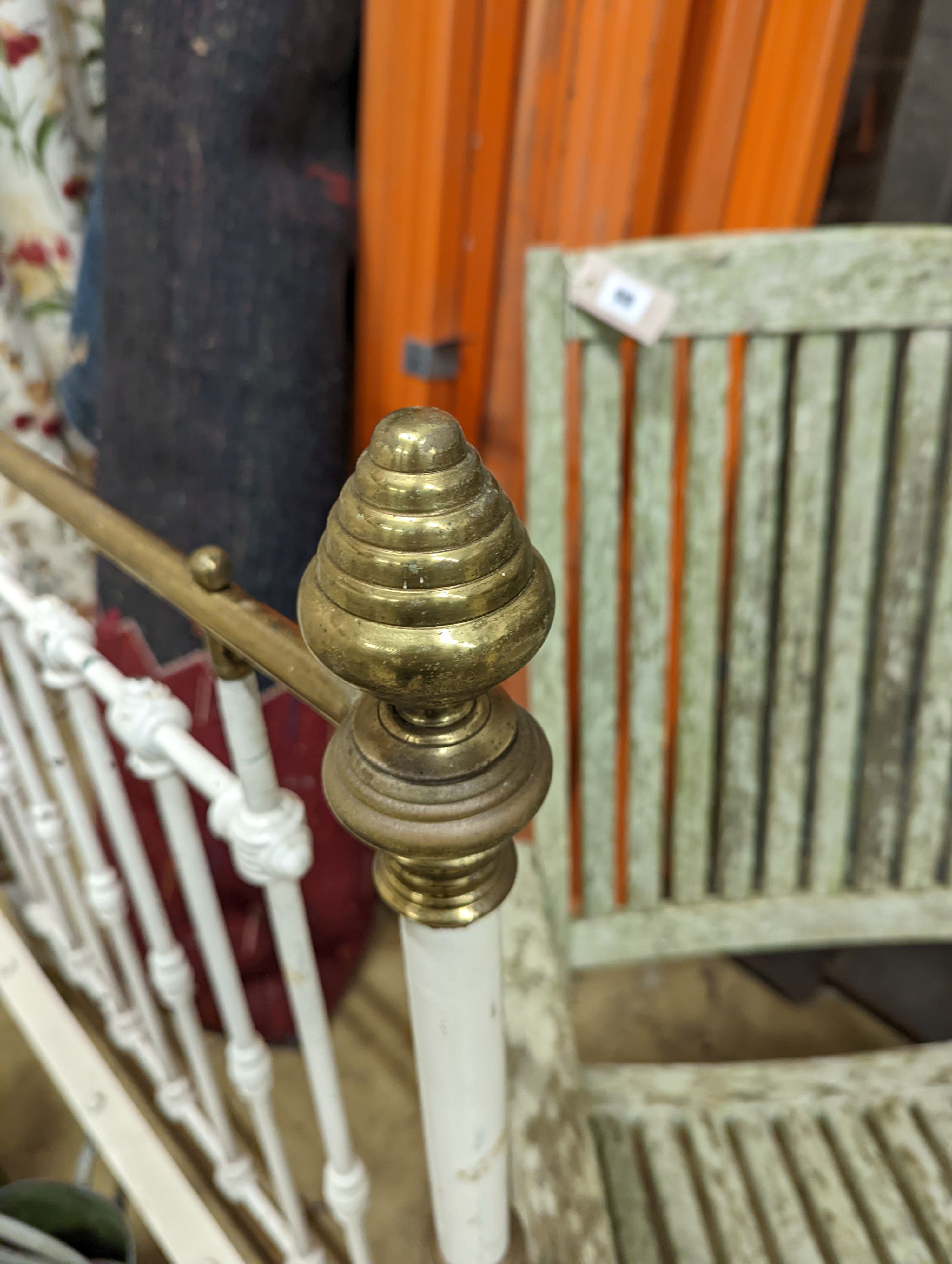 A Victorian painted brass mounted iron single bed frame. Length 202cm, Width-94cm, Height-145cm.